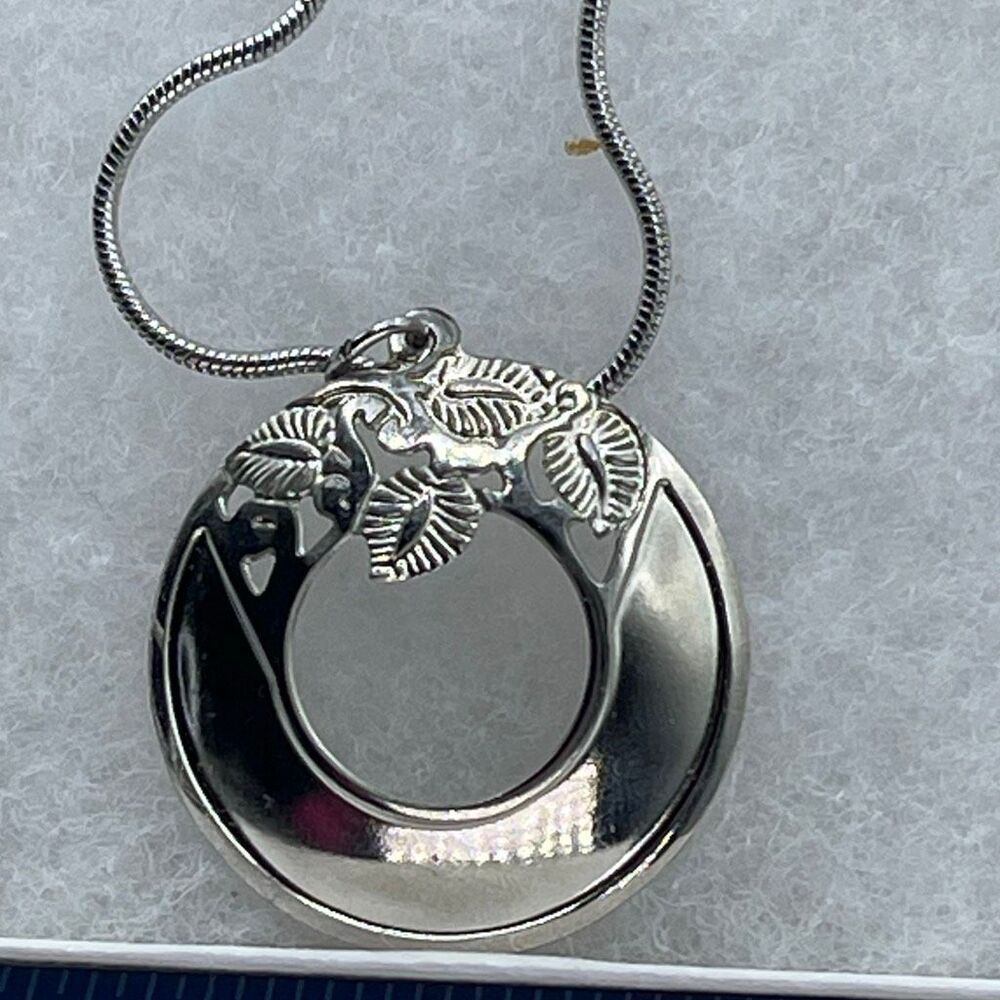 Vintage Beren necklace open cut pendant signed.